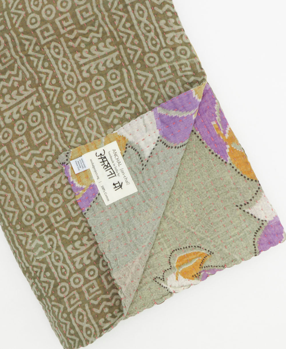 Kantha quilt throw featuring traditional kantha hand stitching