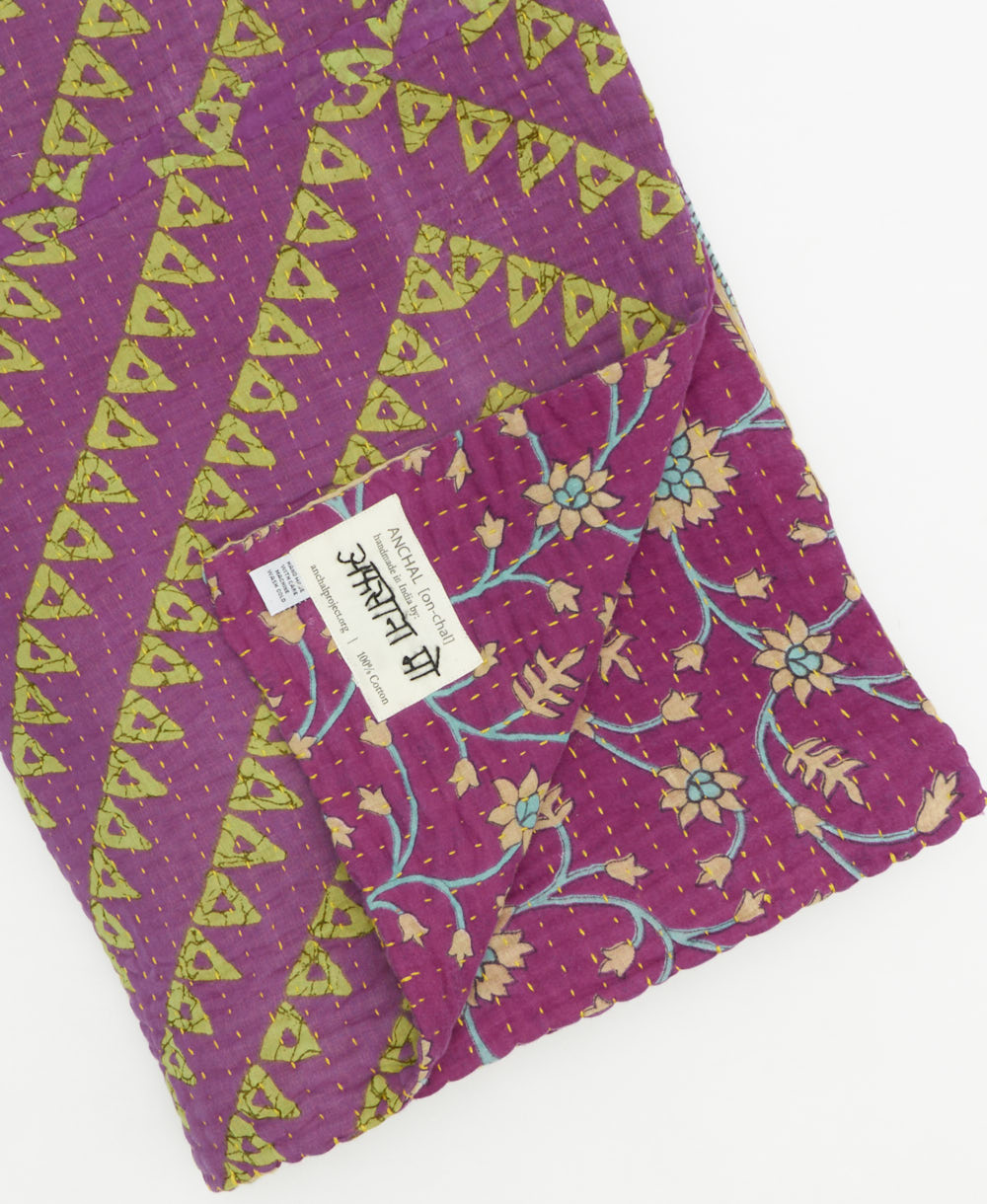 Kantha quilt throw featuring traditional kantha hand stitching