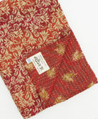 Kantha quilt throw featuring traditional kantha hand stitching