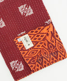 Kantha quilt throw featuring traditional kantha hand stitching