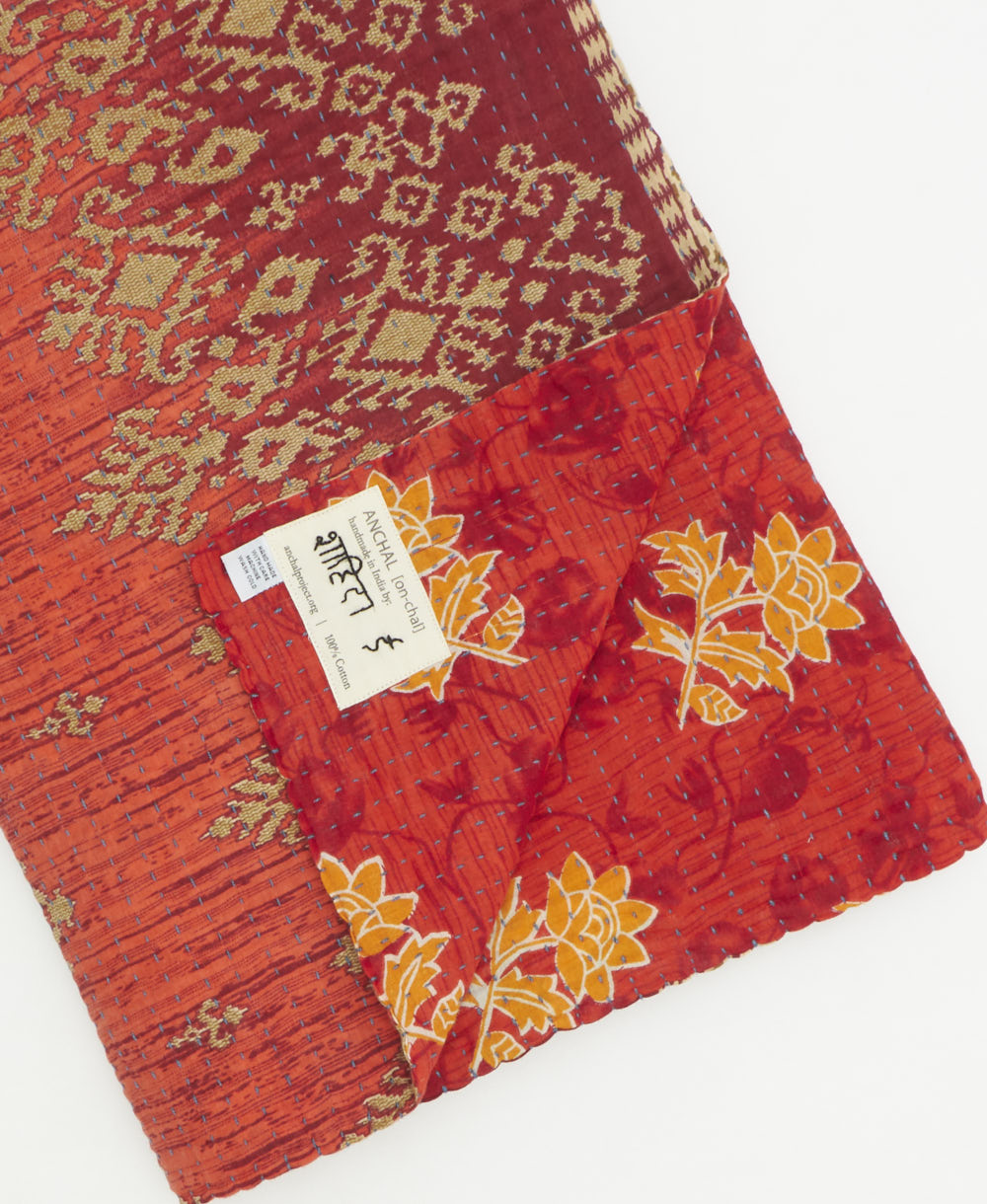 Kantha quilt throw featuring traditional kantha hand stitching