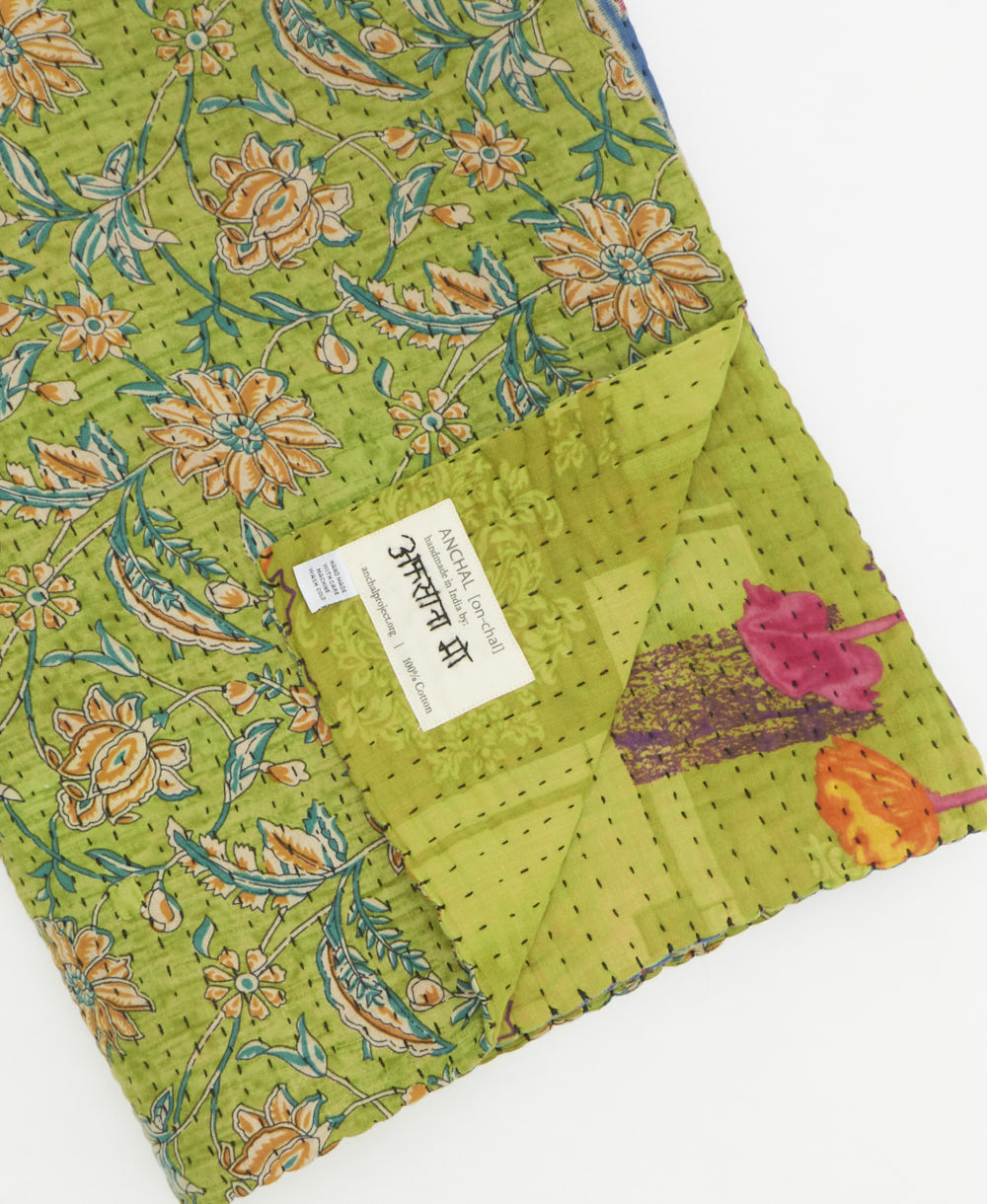 Kantha quilt throw featuring traditional kantha hand stitching