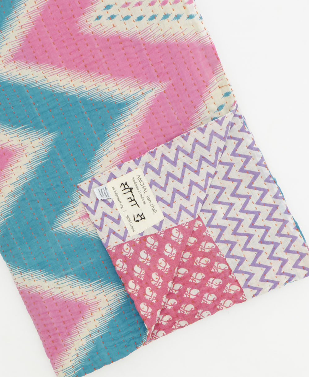 Kantha quilt throw featuring traditional kantha hand stitching