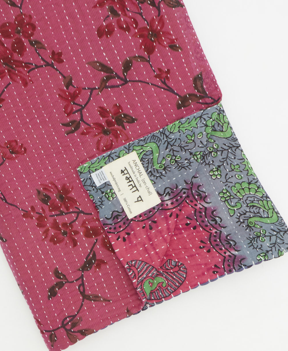 Kantha quilt throw featuring traditional kantha hand stitching