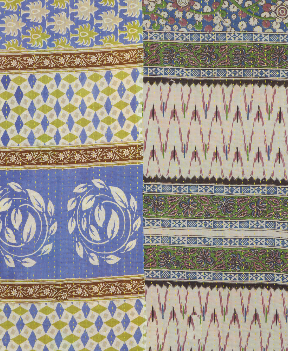 kantha quilt throw with a tag featuring the hand-stitched signature of the maker