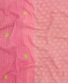 kantha quilt throw with a tag featuring the hand-stitched signature of the maker