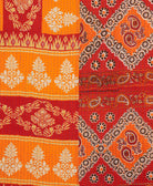 kantha quilt throw with a tag featuring the hand-stitched signature of the maker