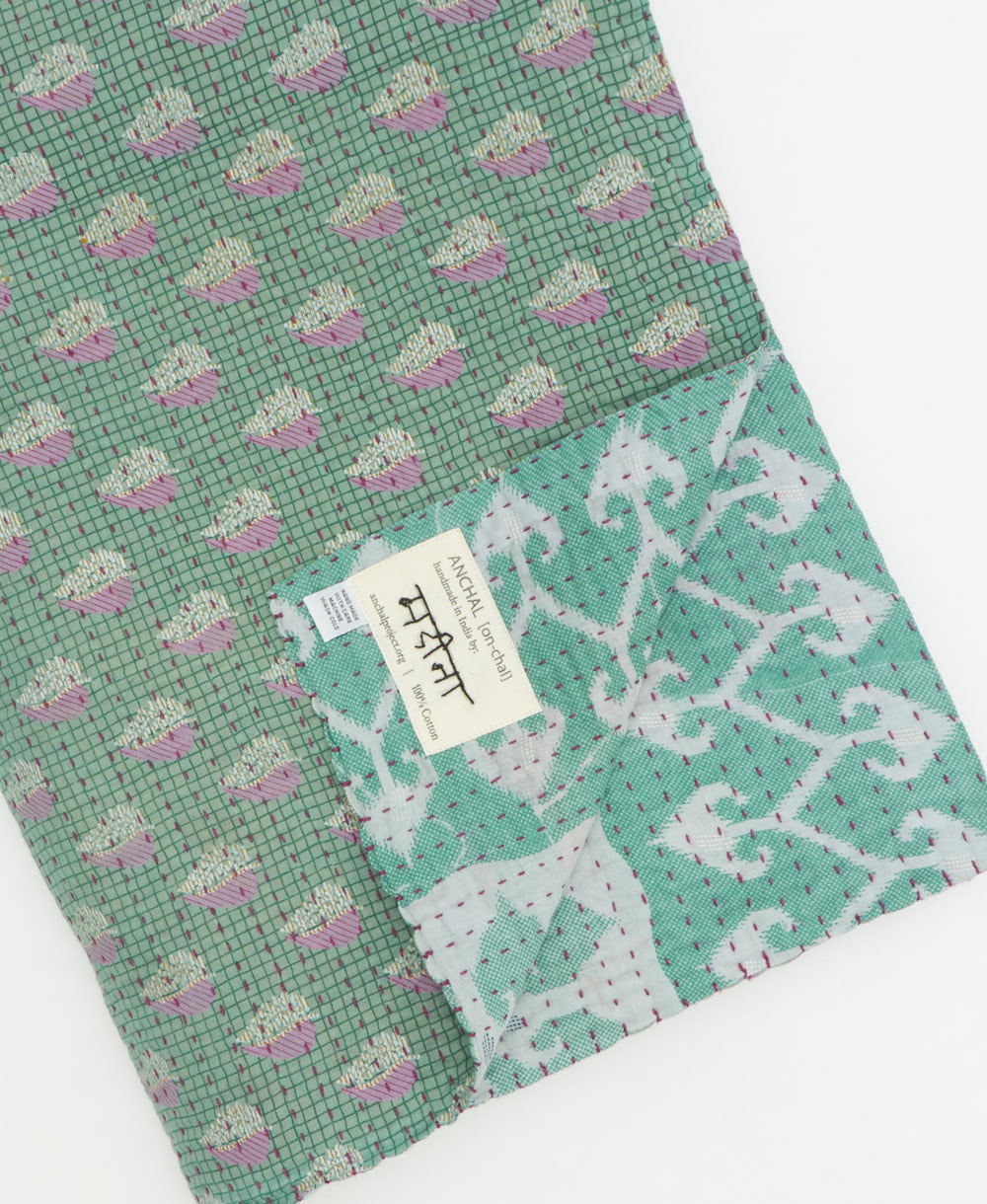 Kantha quilt throw featuring traditional kantha hand stitching