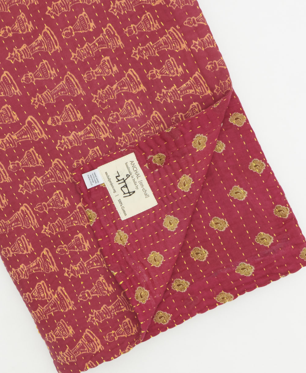 Kantha quilt throw featuring traditional kantha hand stitching