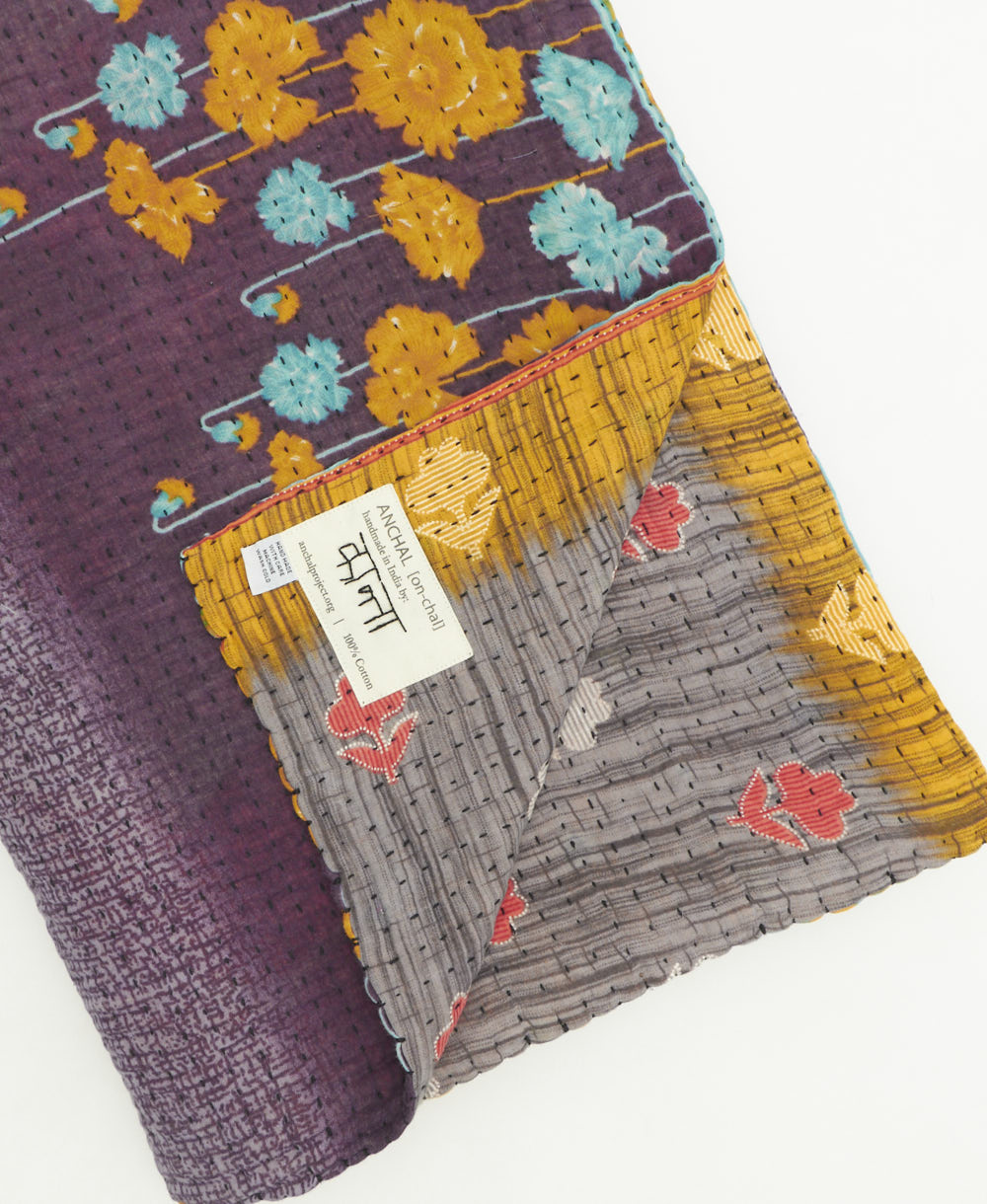 kantha quilt throw featuring traditional kantha hand stitching