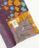 kantha quilt throw featuring traditional kantha hand stitching