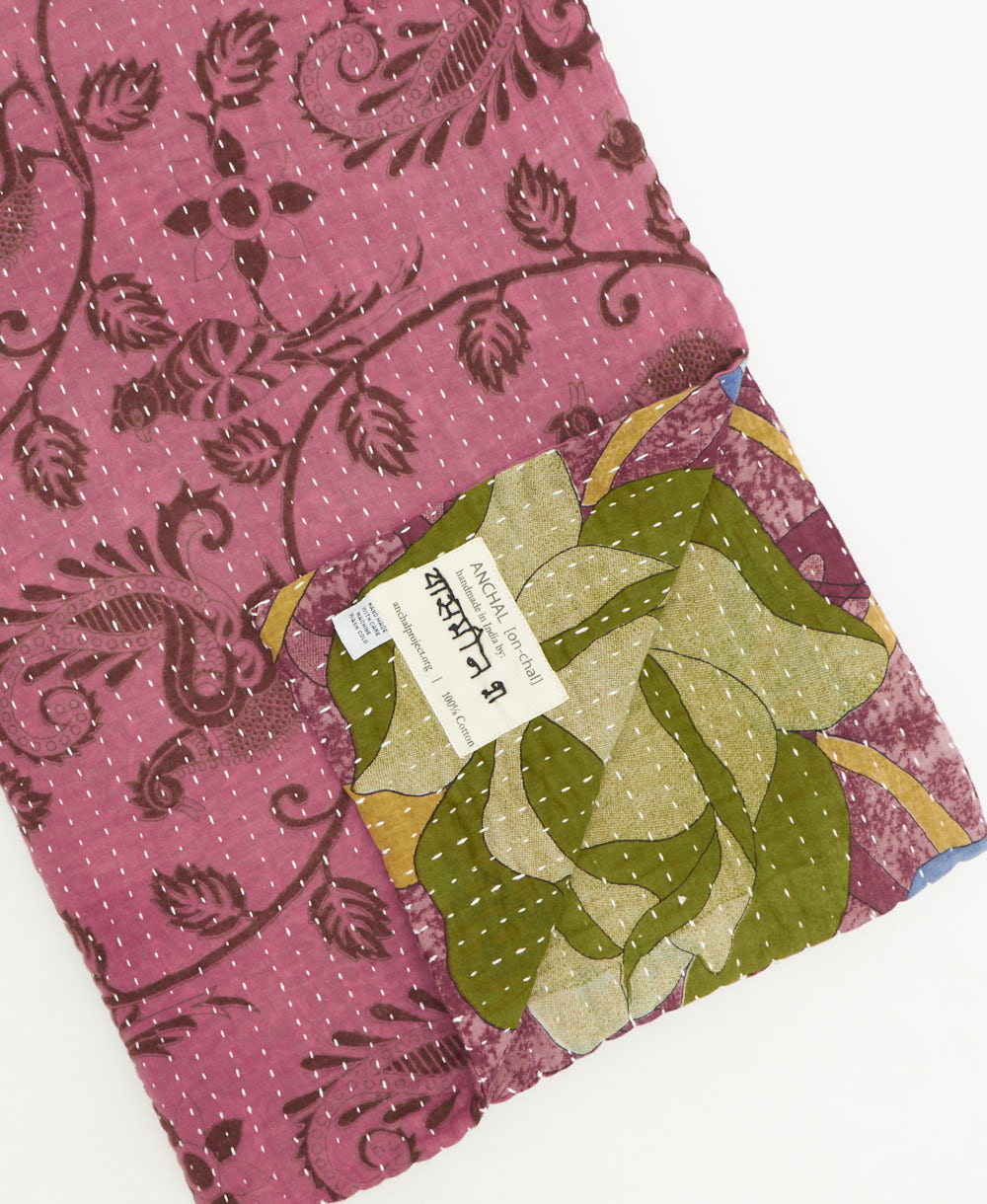 kantha quilt throw featuring traditional kantha hand stitching