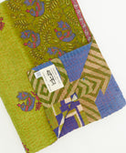 kantha quilt throw featuring traditional kantha hand stitching