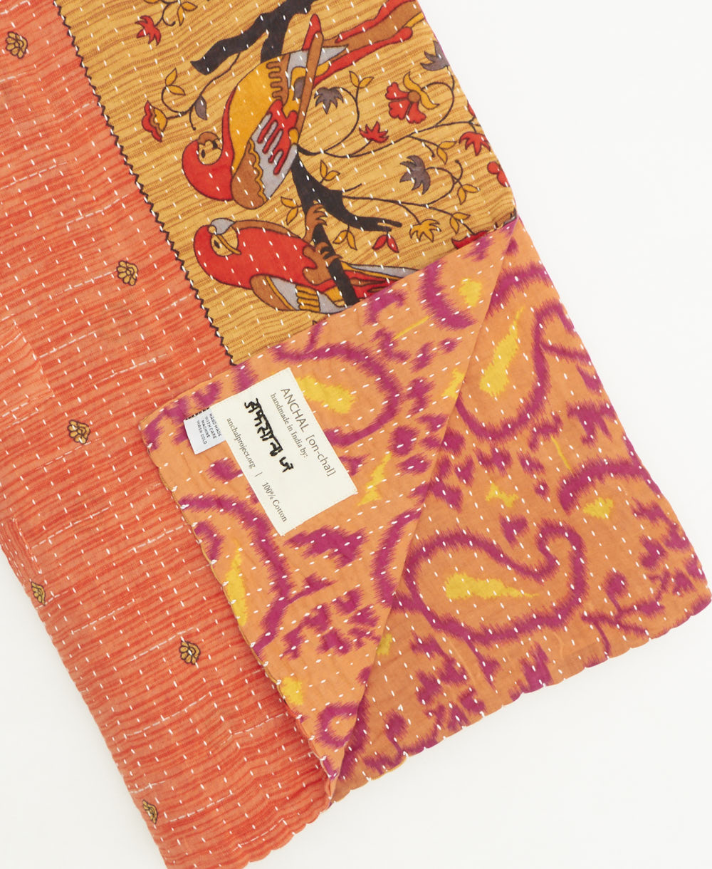 kantha quilt throw featuring traditional kantha hand stitching