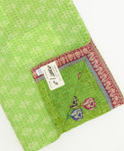 kantha quilt throw featuring traditional kantha hand stitching