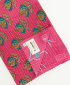 kantha quilt throw featuring traditional kantha hand stitching