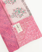 kantha quilt throw featuring traditional kantha hand stitching