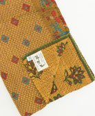 kantha quilt throw featuring traditional kantha hand stitching