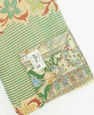 kantha quilt throw featuring traditional kantha hand stitching