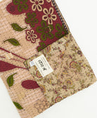 kantha quilt throw featuring traditional kantha hand stitching