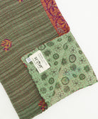 kantha quilt throw featuring traditional kantha hand stitching