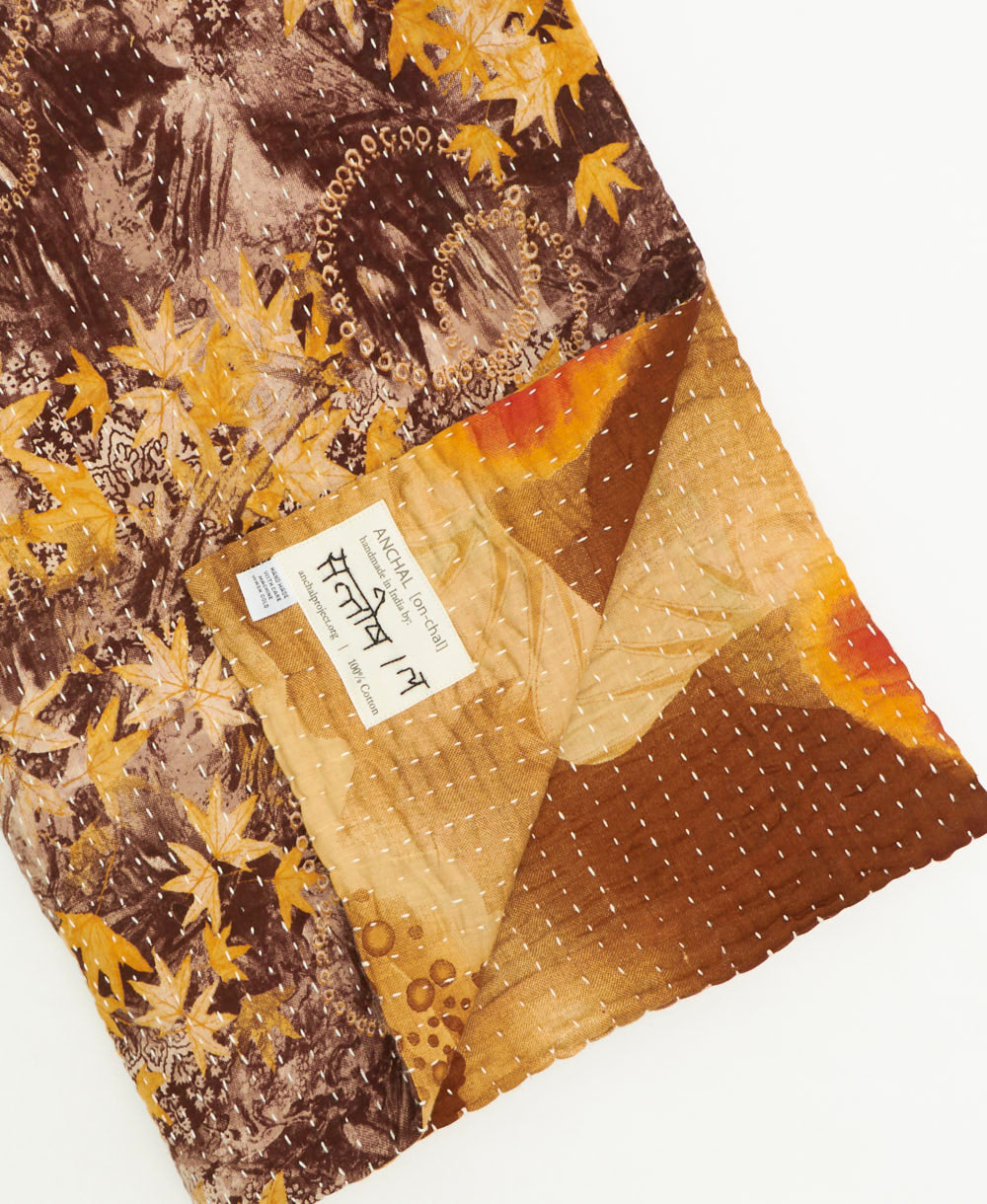kantha quilt throw featuring traditional kantha hand stitching