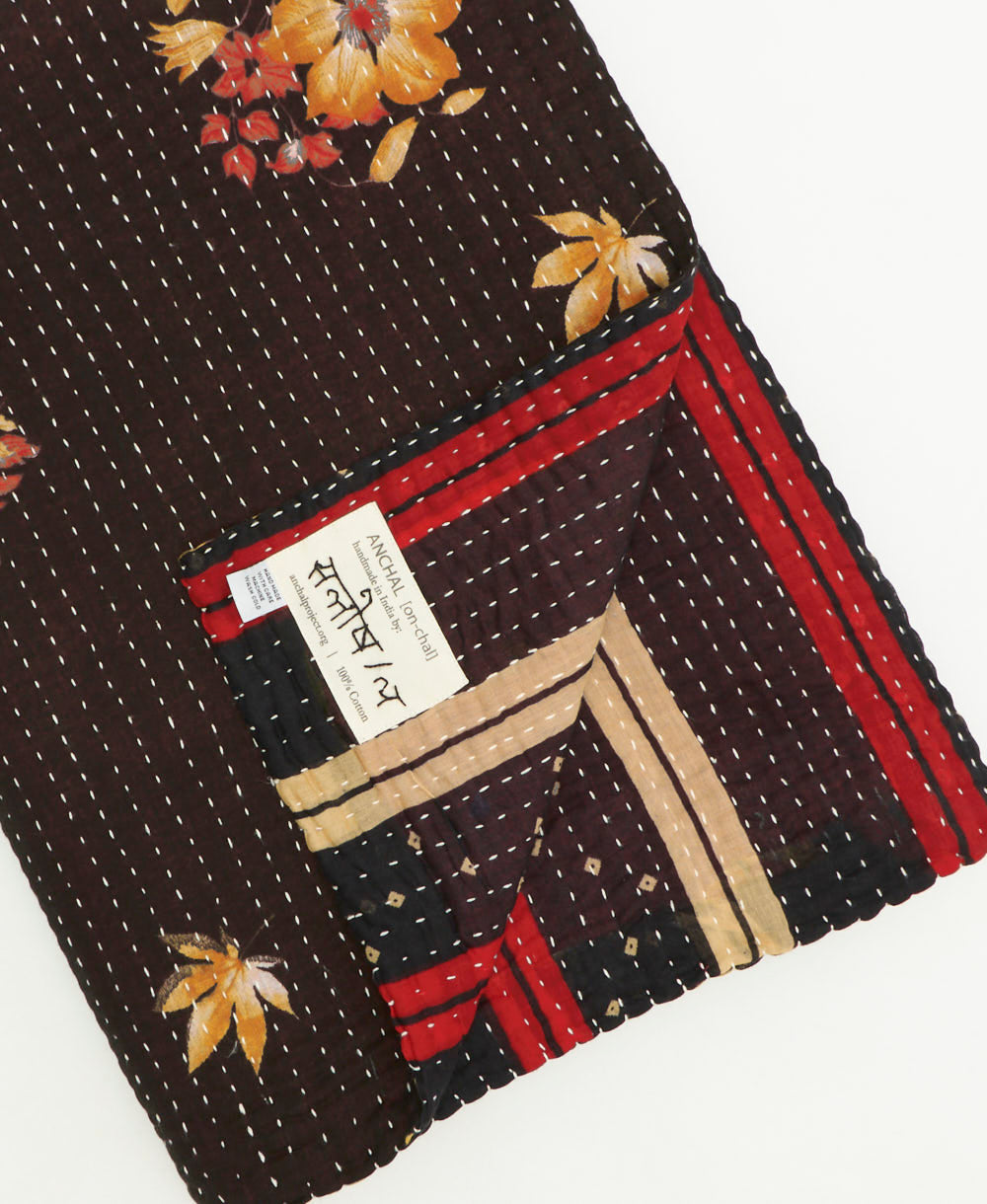 kantha quilt throw featuring traditional kantha hand stitching
