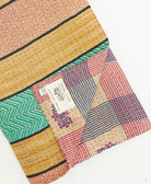kantha quilt throw featuring traditional kantha hand stitching