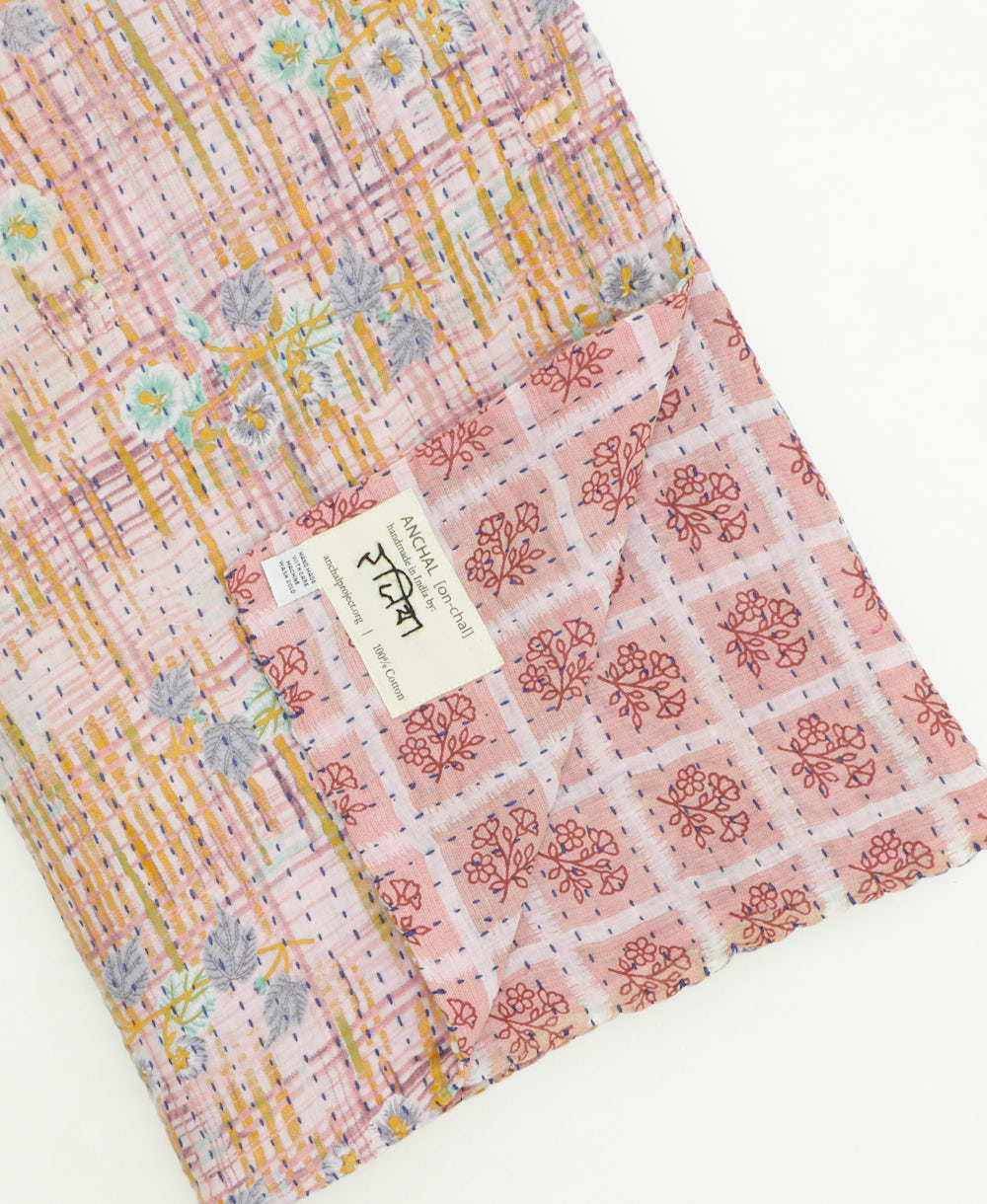 kantha quilt throw featuring traditional kantha hand stitching