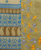 kantha quilt throw with a tag featuring the hand-stitched signature of the maker