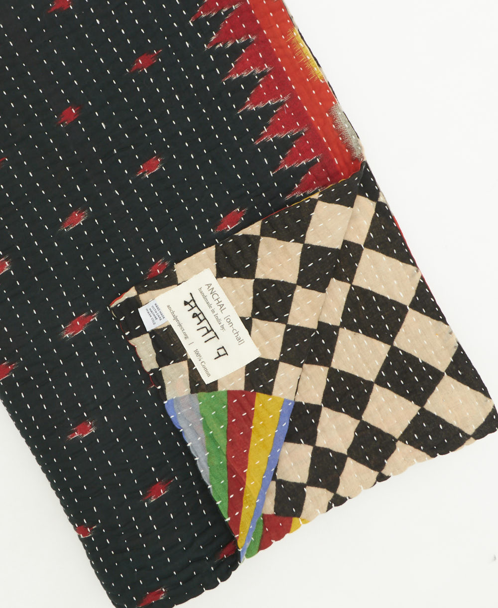 kantha quilt throw featuring traditional kantha hand stitching