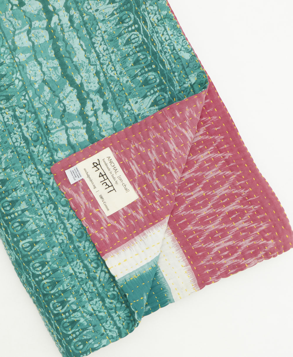 kantha quilt throw featuring traditional kantha hand stitching