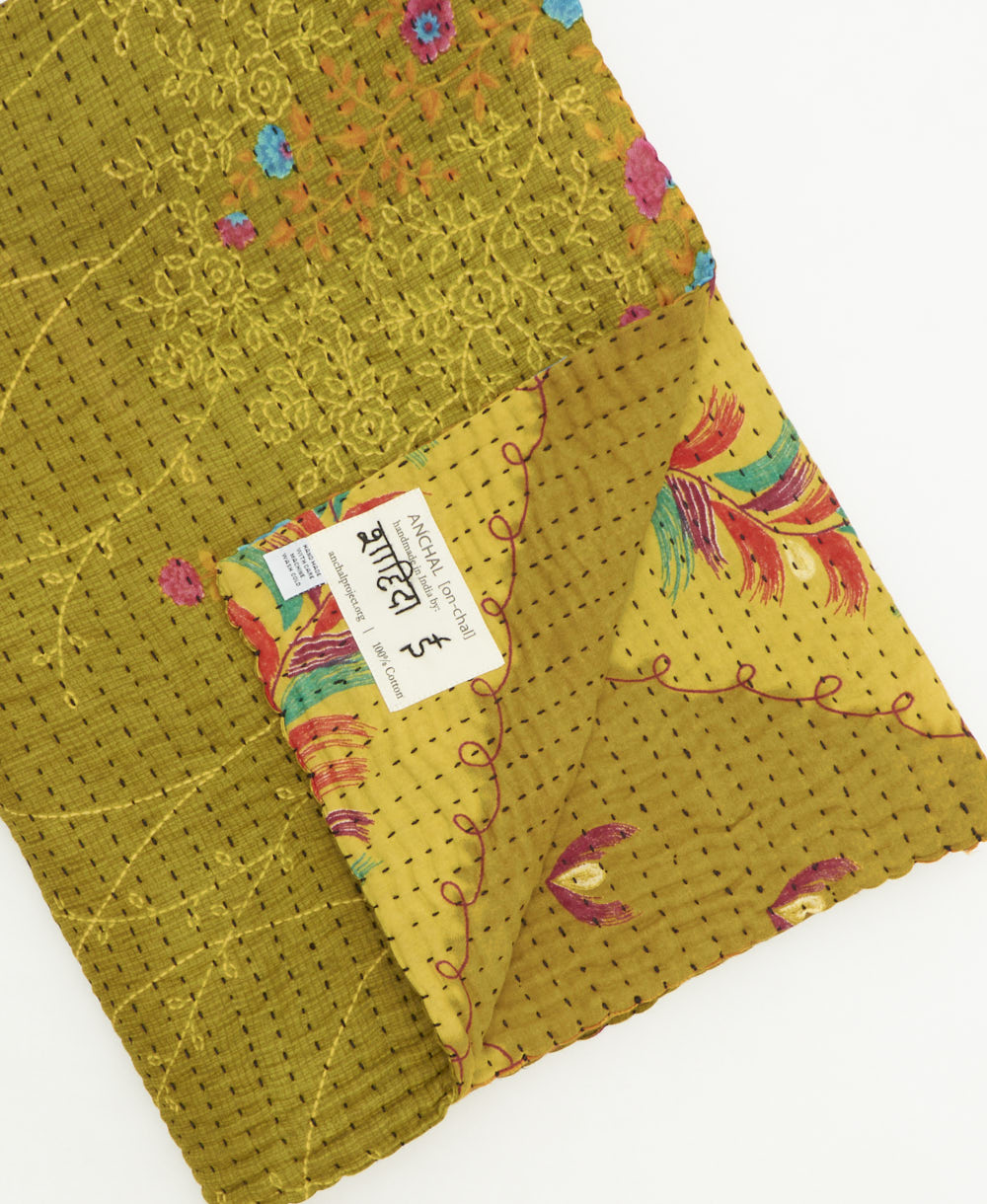 kantha quilt throw featuring traditional kantha hand stitching