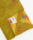 kantha quilt throw featuring traditional kantha hand stitching