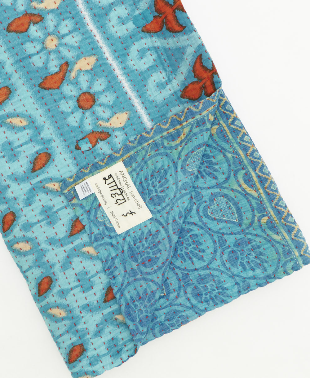 kantha quilt throw featuring traditional kantha hand stitching