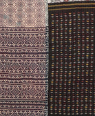 kantha quilt throw with a tag featuring the hand-stitched signature of the maker