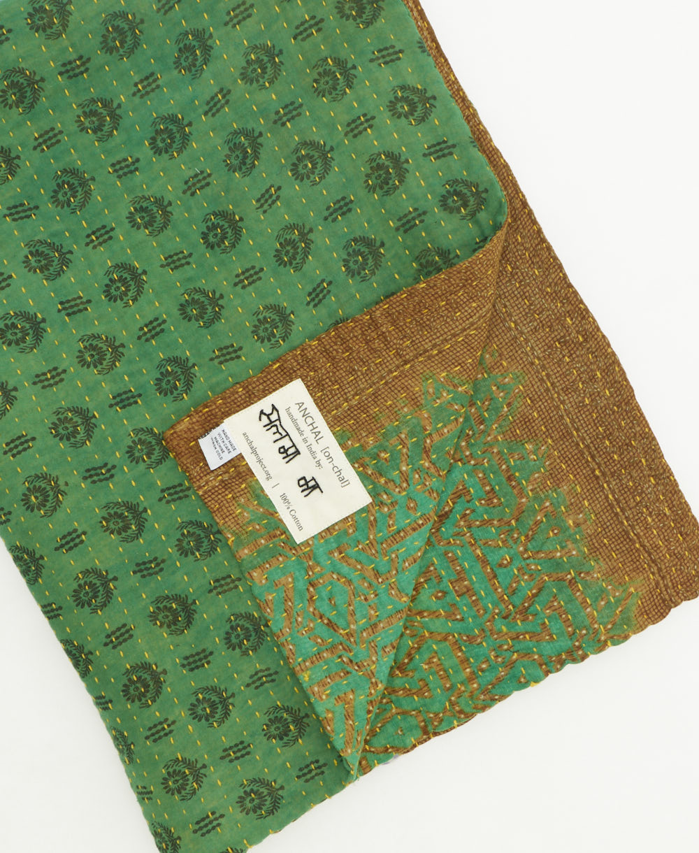 kantha quilt throw featuring traditional kantha hand stitching