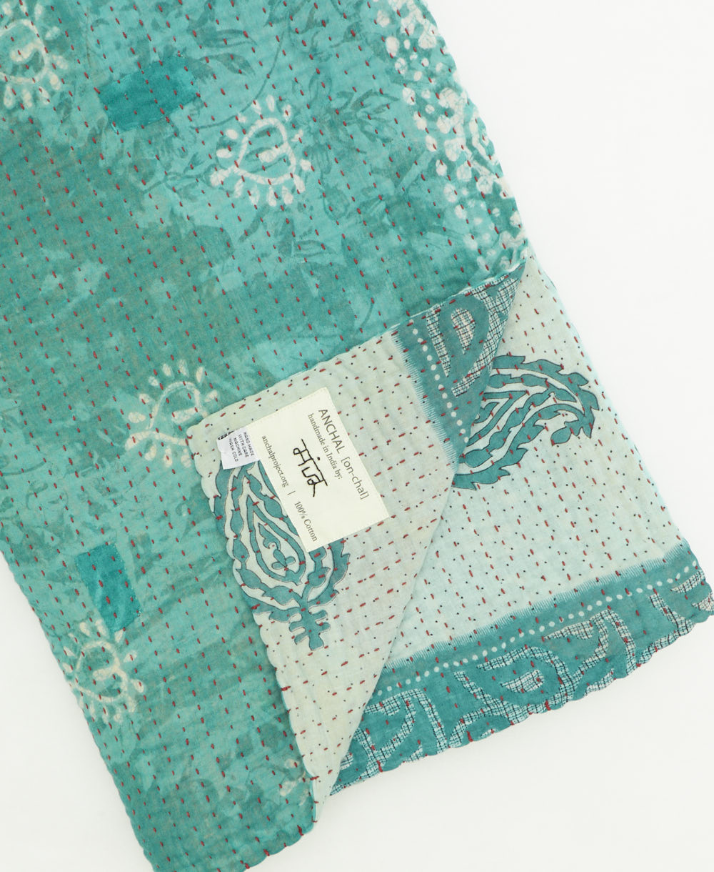 kantha quilt throw featuring traditional kantha hand stitching
