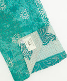 kantha quilt throw featuring traditional kantha hand stitching