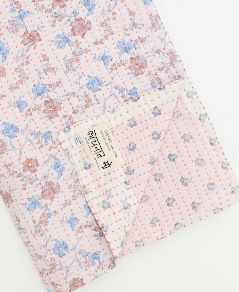 kantha quilt throw featuring traditional kantha hand stitching
