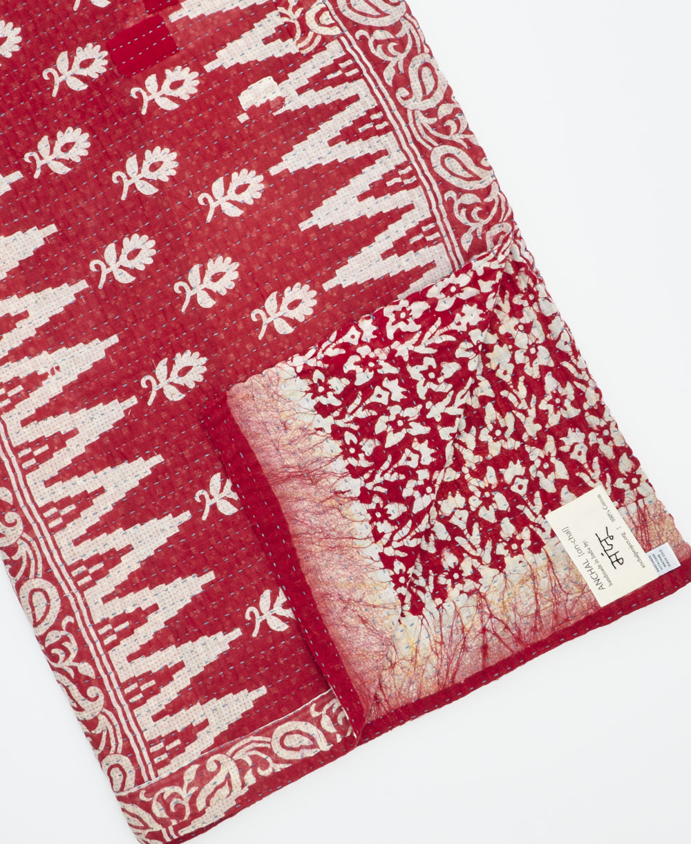 Kantha quilt throw featuring traditional kantha hand stitching
