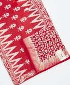 Kantha quilt throw featuring traditional kantha hand stitching