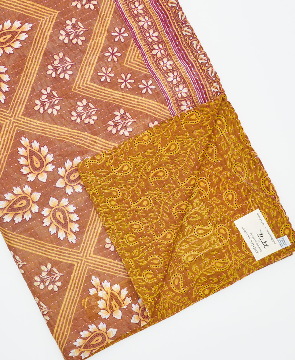 Kantha quilt throw featuring traditional kantha hand stitching