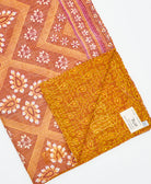 Kantha quilt throw featuring traditional kantha hand stitching