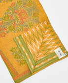 Kantha quilt throw featuring traditional kantha hand stitching