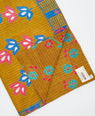 Kantha quilt throw featuring traditional kantha hand stitching