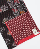 Kantha quilt throw featuring traditional kantha hand stitching