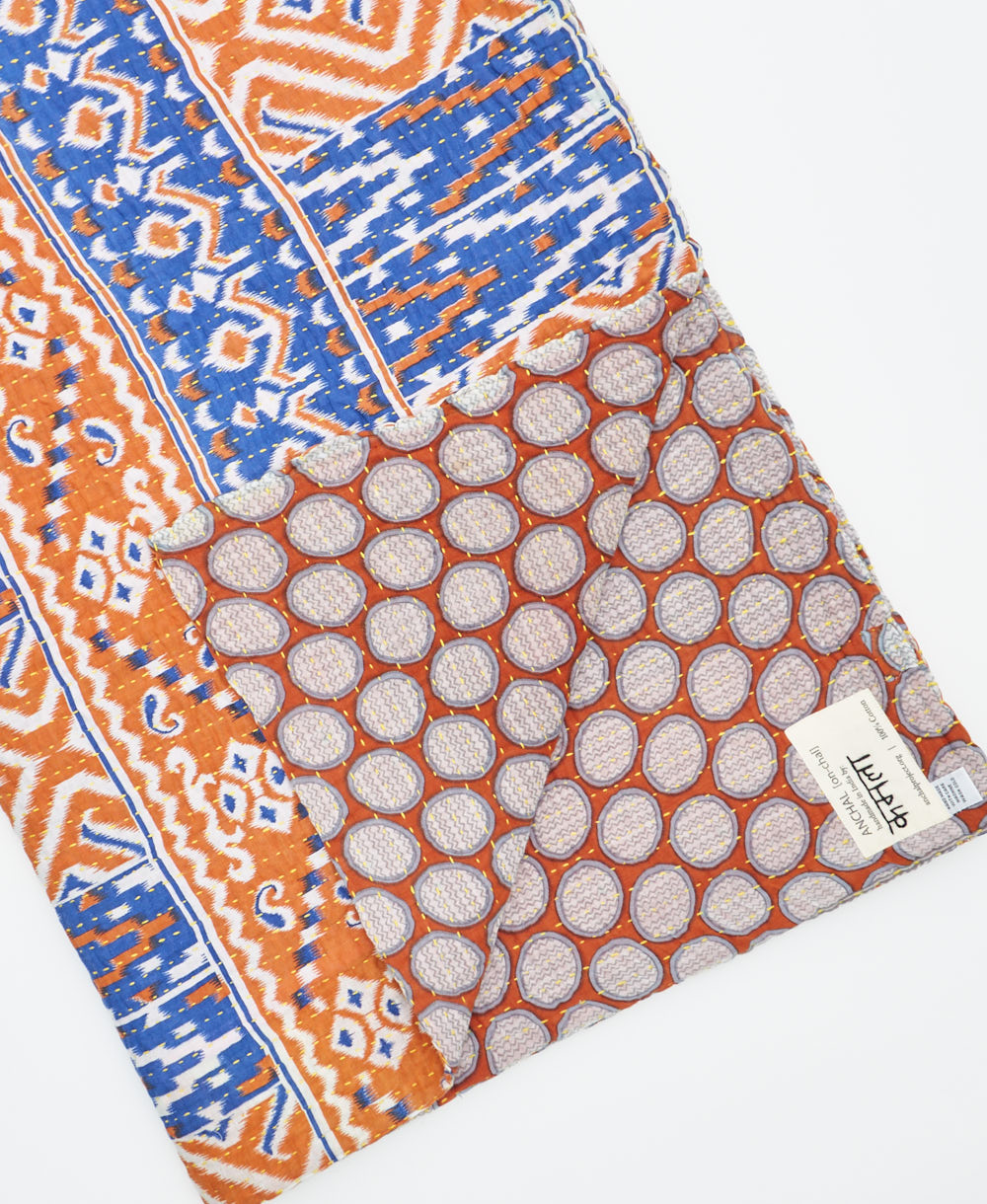 Kantha quilt throw featuring traditional kantha hand stitching