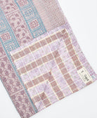 Kantha quilt throw featuring traditional kantha hand stitching