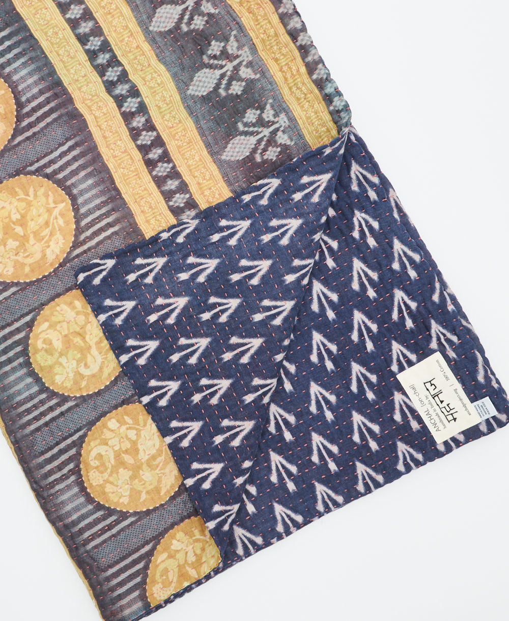 Kantha quilt throw featuring traditional kantha hand stitching